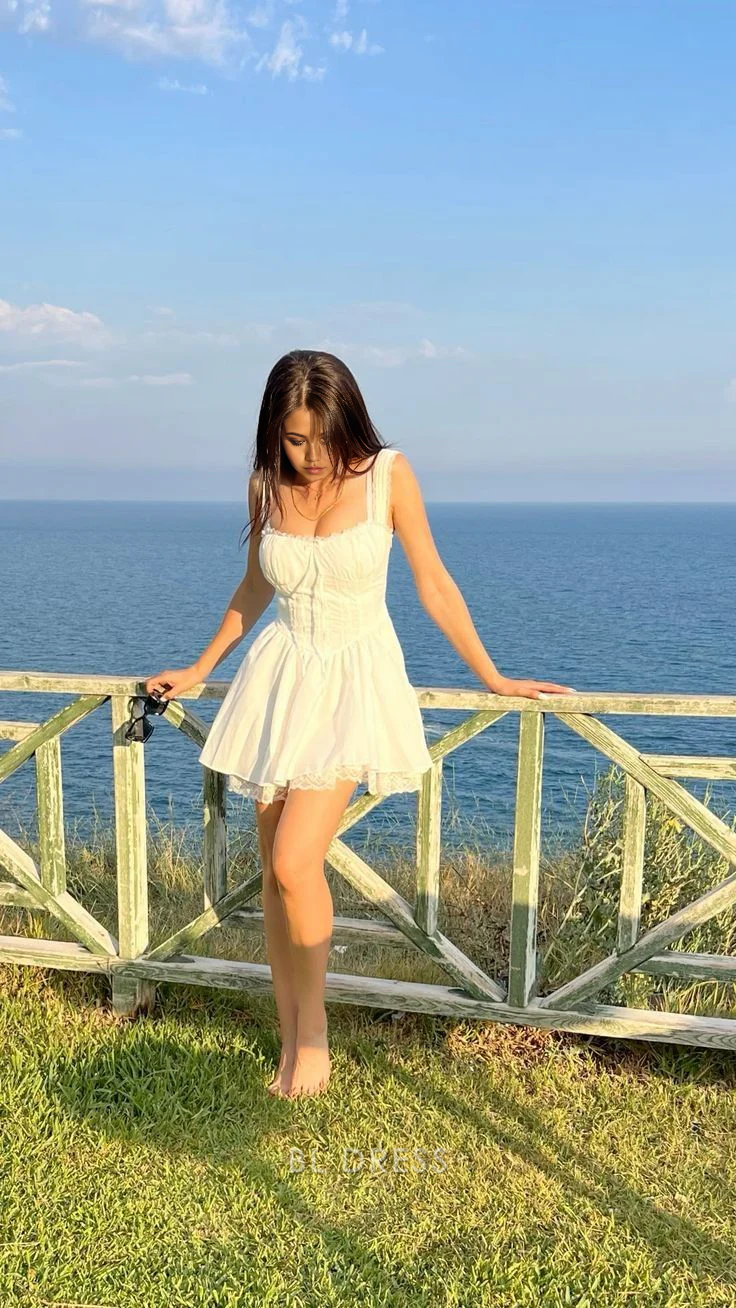 White A-Line short dress with a sweetheart neckline, suitable for homecoming or prom.