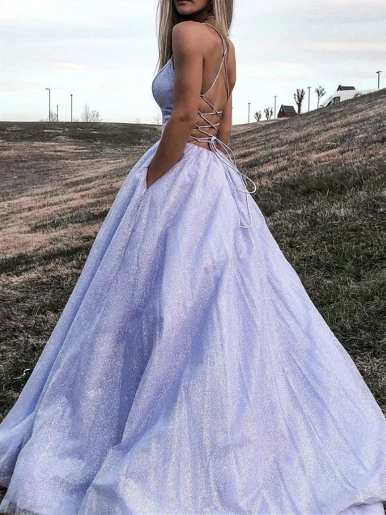 Full-length elegant A-line backless formal gown.
