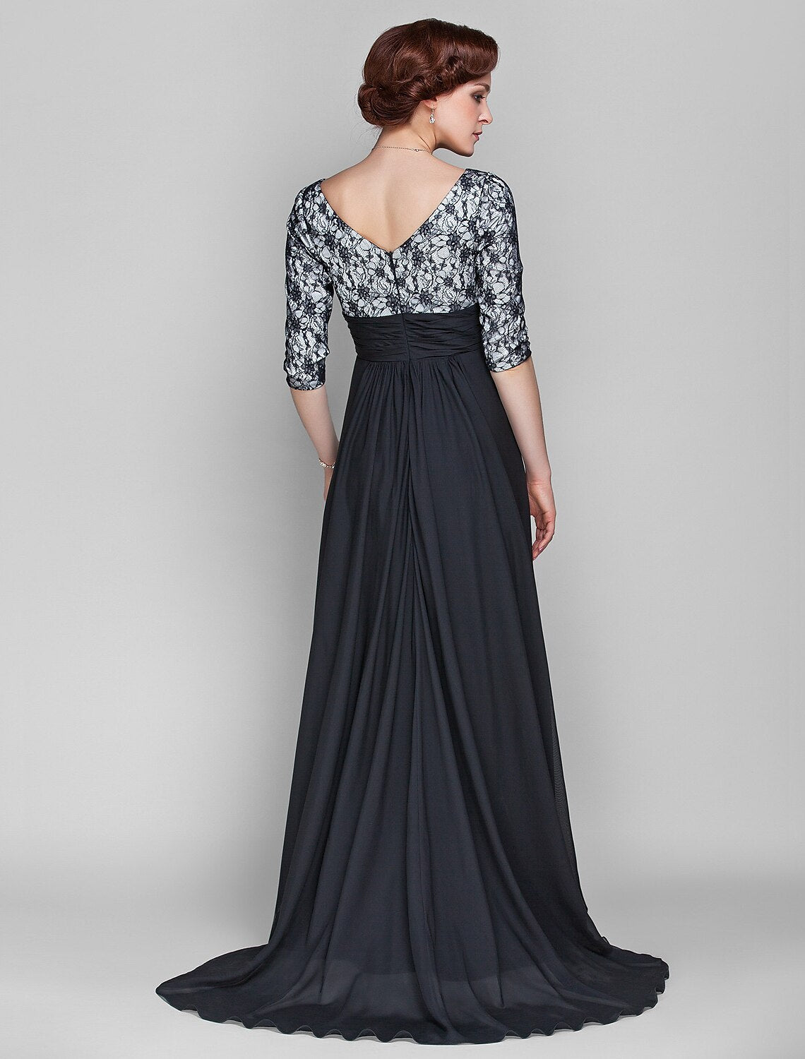 Side view of the chiffon lace A-line gown with a sweep train.