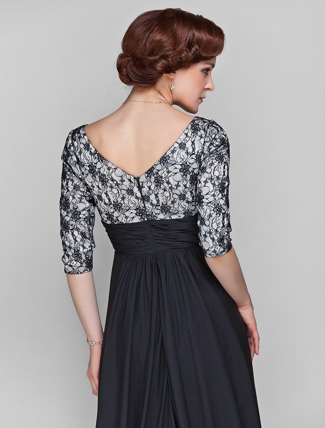 Full length view of the sophisticated Mother of the Bride gown.