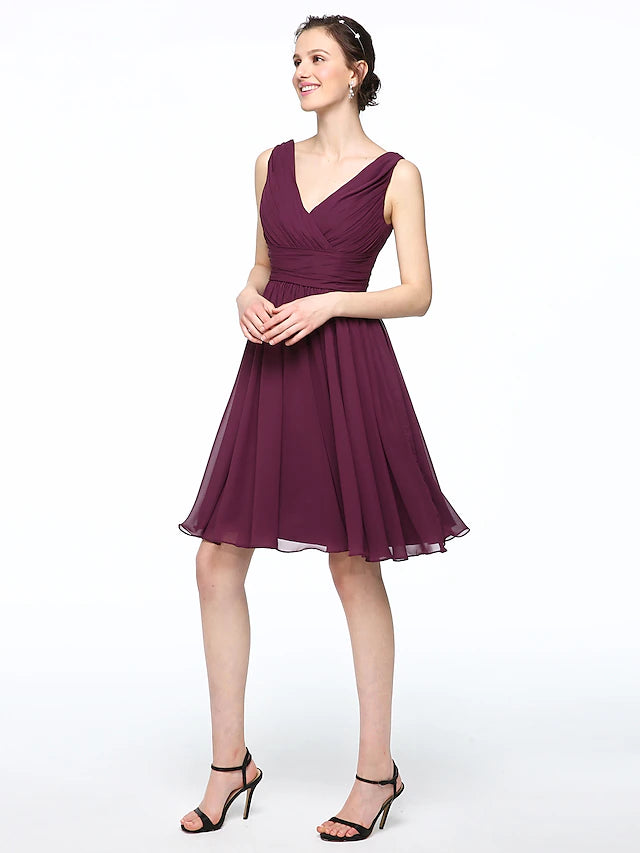 Close-up of pleated detail on A-Line V-neck chiffon dress.