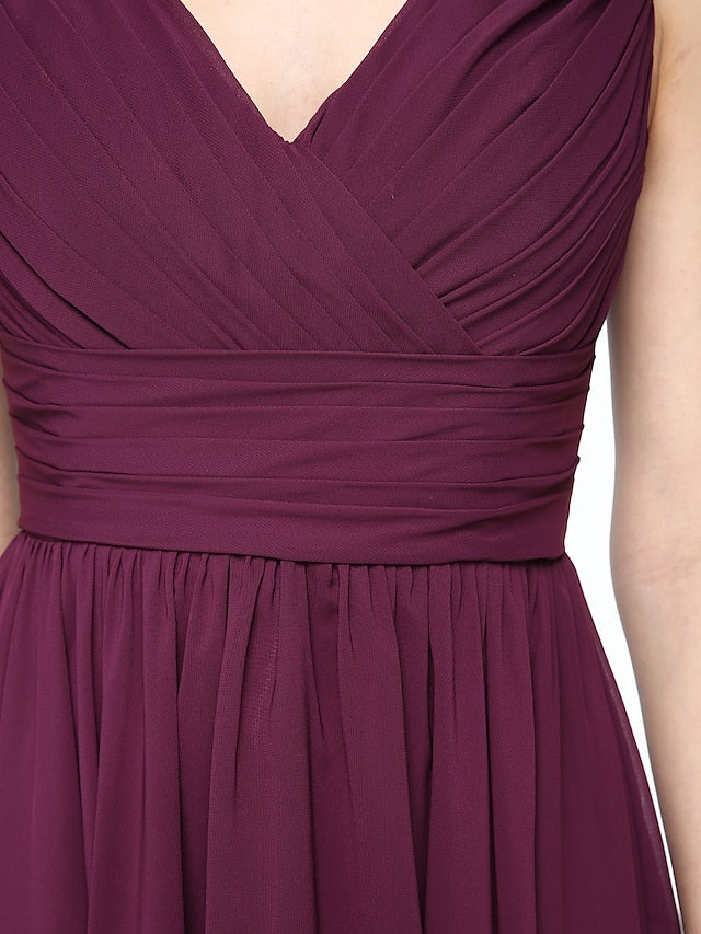 A-Line V-neck chiffon dress with flowing pleats.
