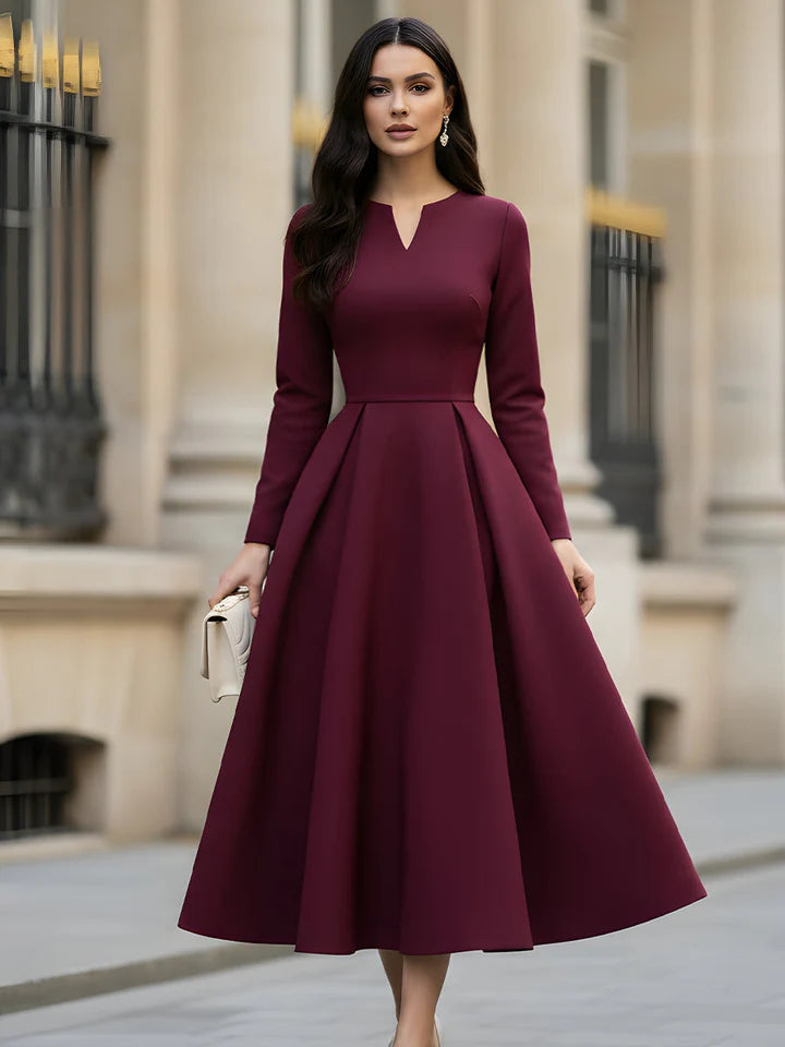 Elegant burgundy V-neck pleated tea-length prom dress.