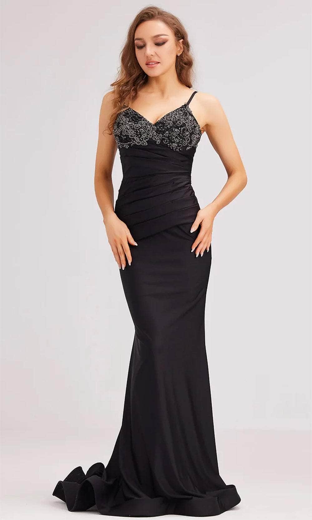 Full length view of the elegant sleeveless prom dress, showcasing its sparkling rhinestones.