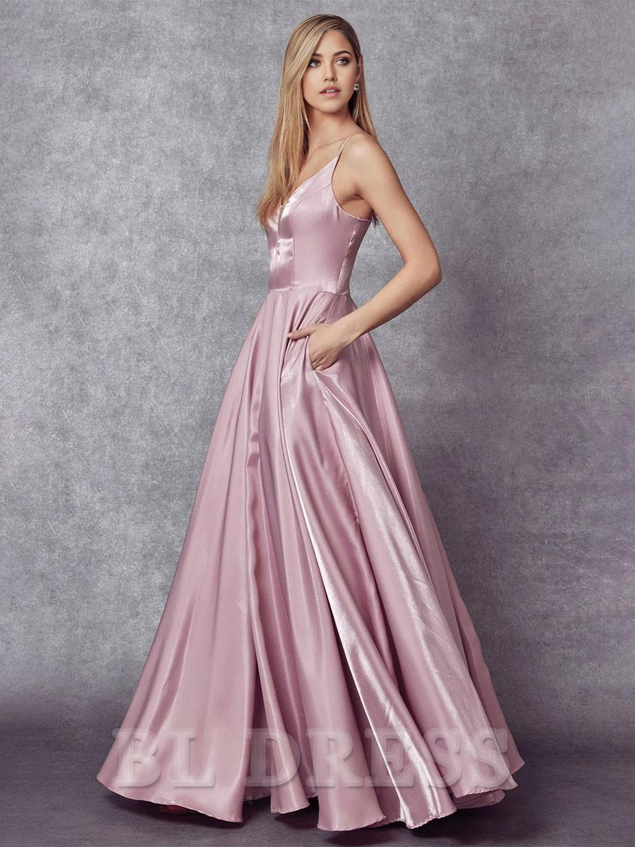Close-up of the V-neckline and satin fabric of the dress.