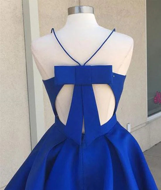 Close-up of the V-neckline and A-line skirt of a short dress.