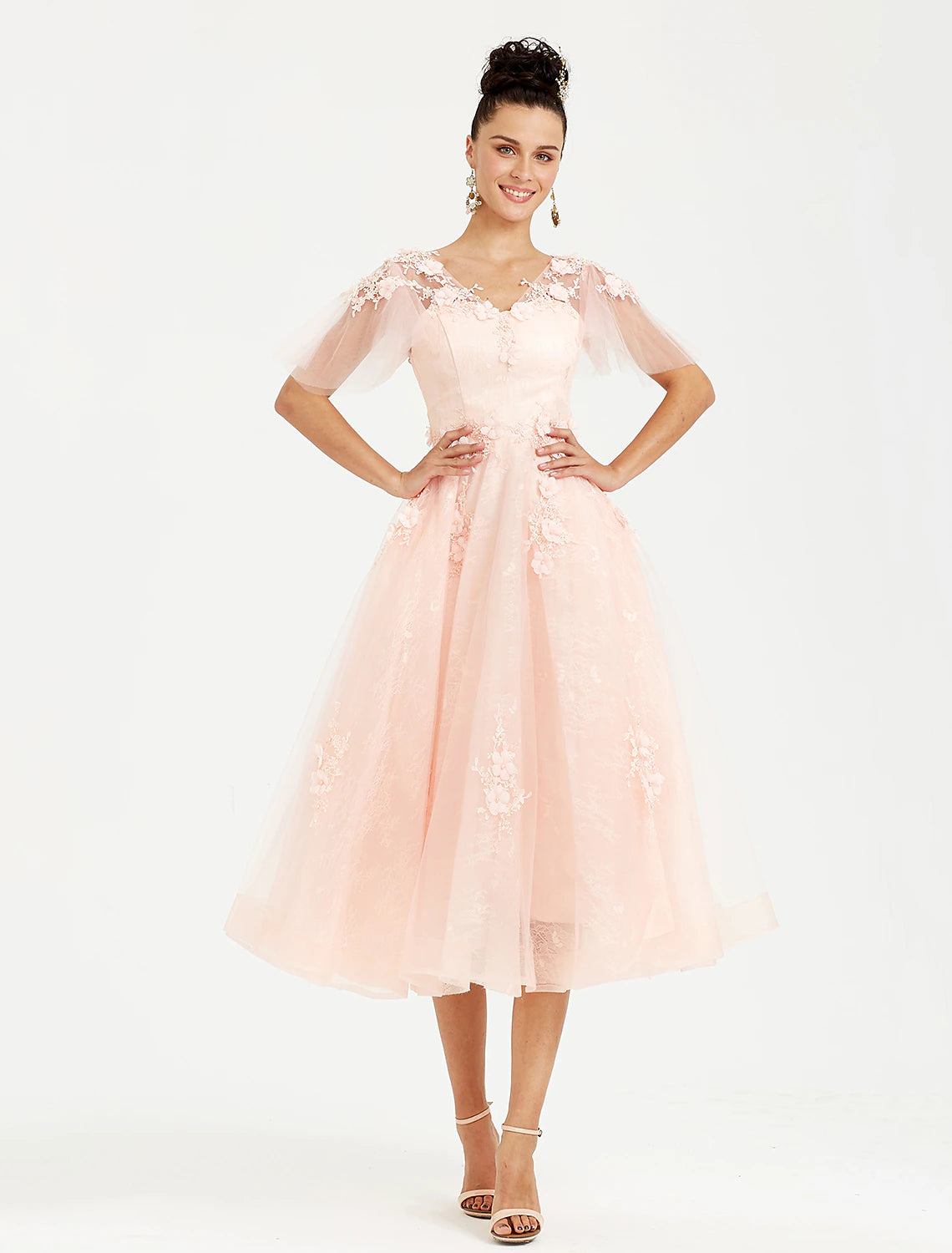Elegant A-Line V-Neck tea length dress with short sleeves and tulle appliques.