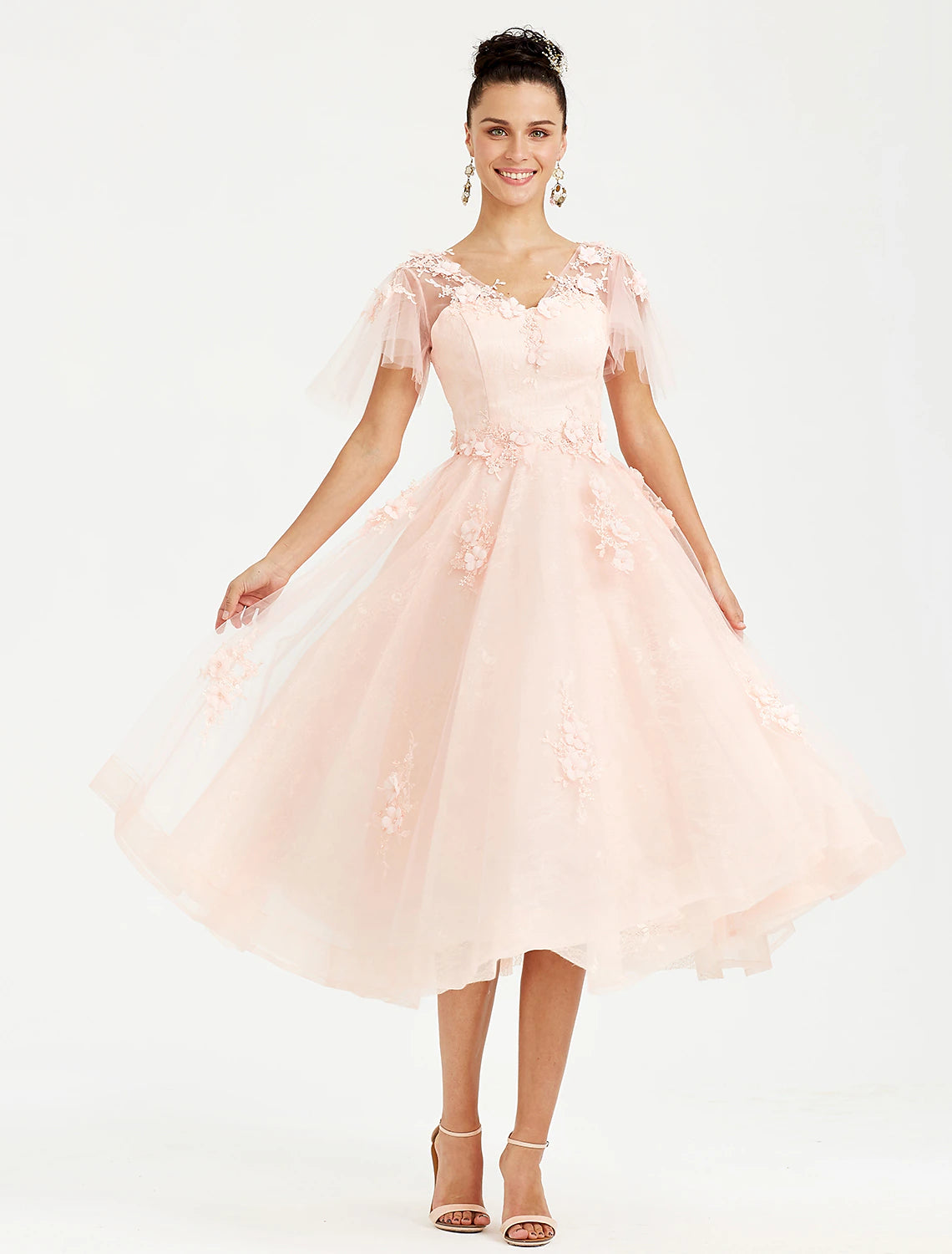 Close-up of the delicate tulle appliques on the A-Line dress.