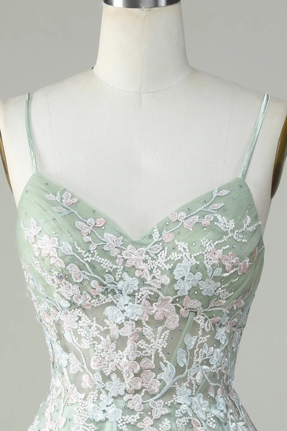 Detail of the criss-cross back straps on the short homecoming dress.
