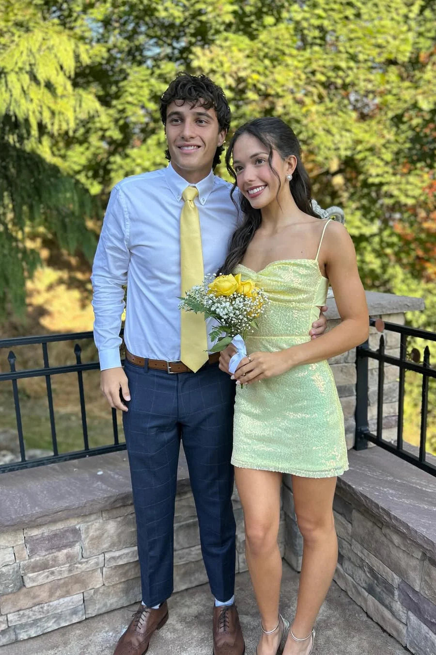Side view of a yellow short dress, highlighting the A-line silhouette.