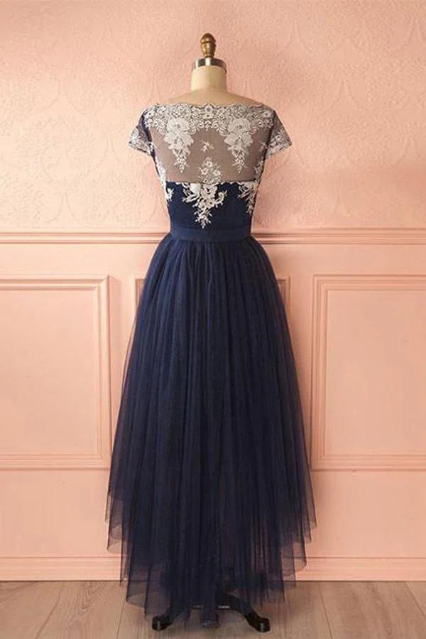 Chic sleeveless evening gown featuring a high-low hemline and delicate lace.