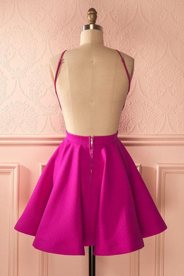 Back view of the hot pink A-line short dress, highlighting the backless design.