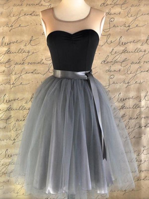 Woman wearing a short A-line round neck dress, suitable for prom or graduation.