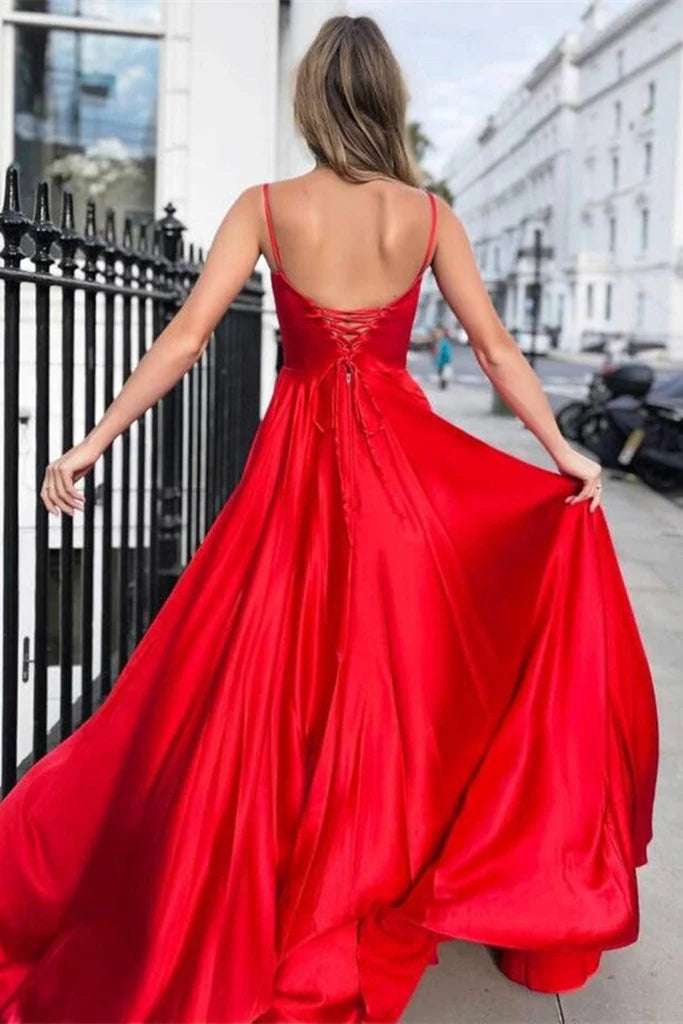Back view of the light blue A-line satin formal gown with scoop neck.