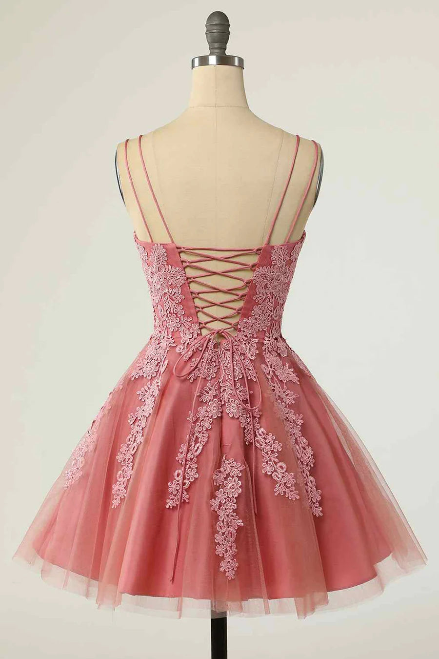 Back view of the A-line mini dress showing lace-up detail.