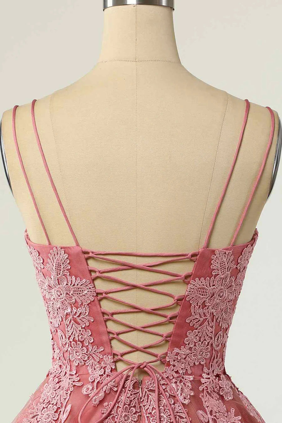 Detail of the double straps and fabric texture of the dress.