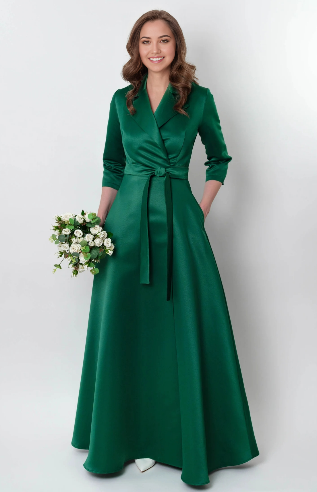 Woman posing in a sophisticated A-line satin formal gown.