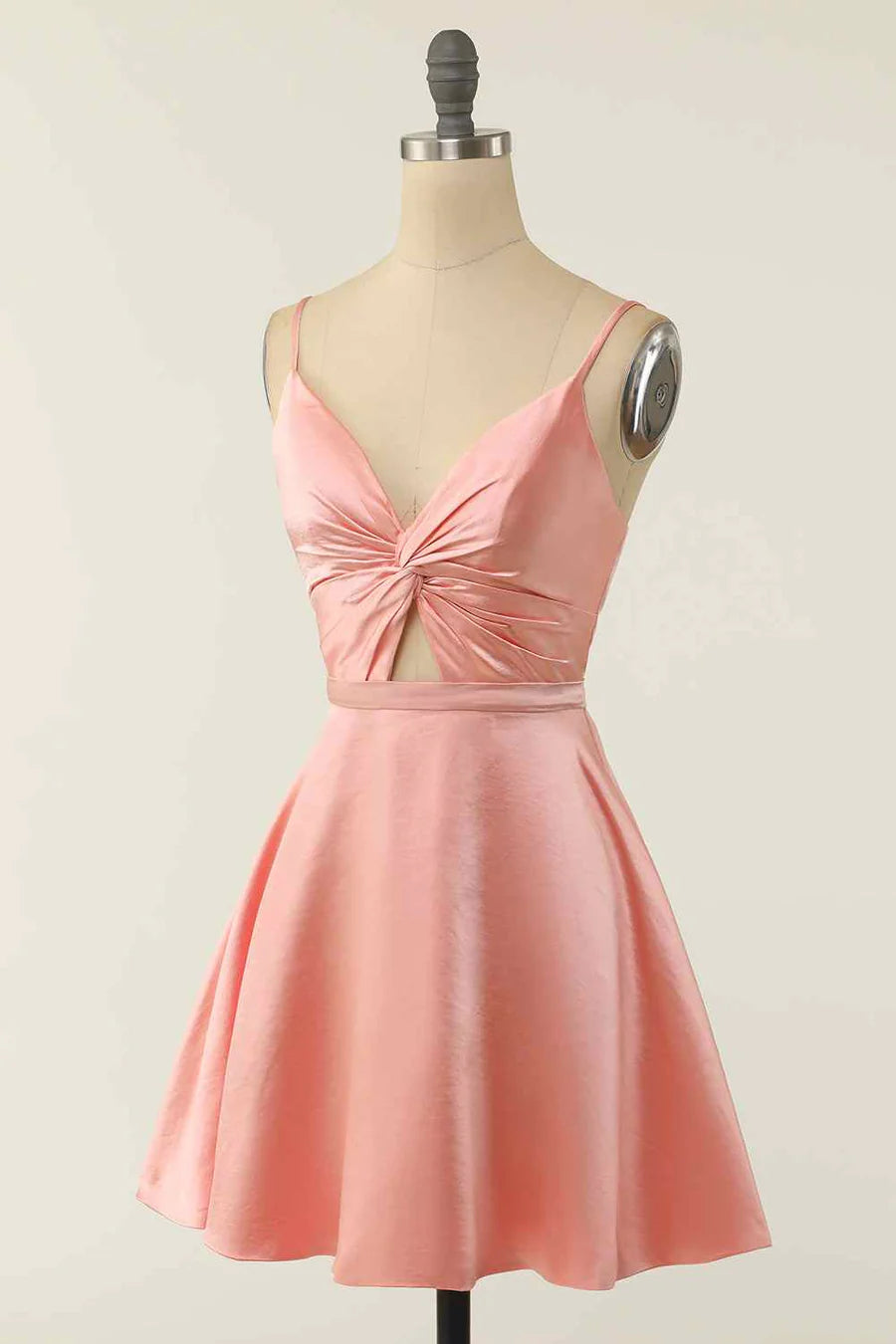 Back view of the black A-line V-neck mini dress, highlighting the skirt.