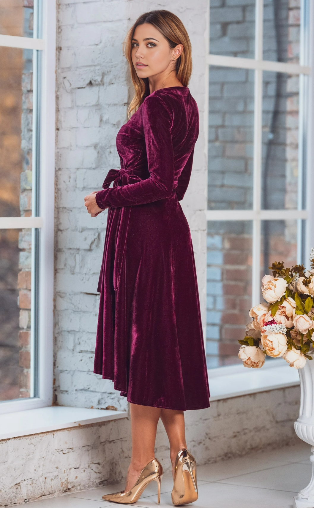 Side view of the chic velvet long sleeve formal dress.