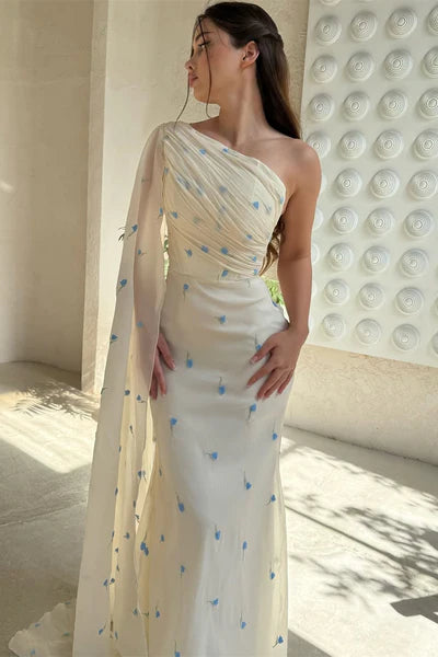 Back view of the chiffon mermaid prom dress with ruffle detail.