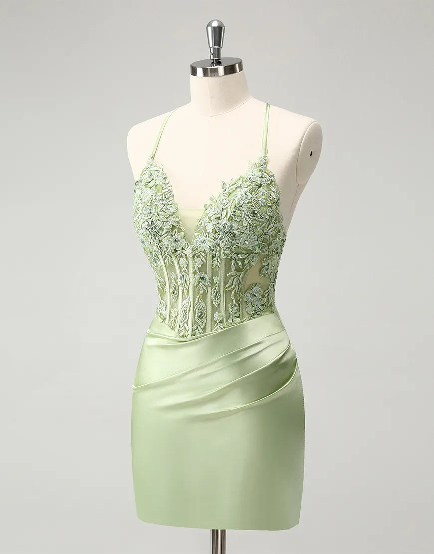 Full length view of a green formal homecoming dress.