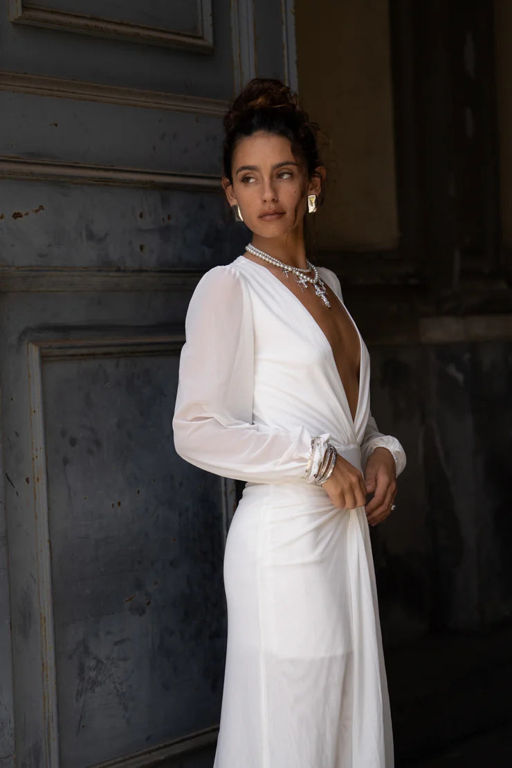 Back view of a model in the stunning white mesh maxi dress.
