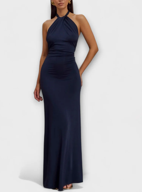 Long formal dress featuring a halter neckline and a graceful silhouette.