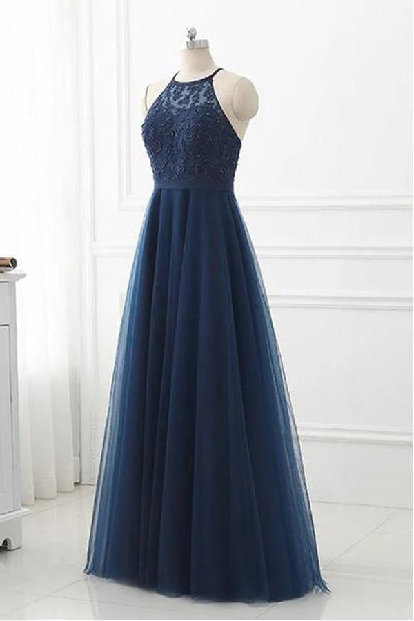 Full length view of the flowing tulle lace prom dress.