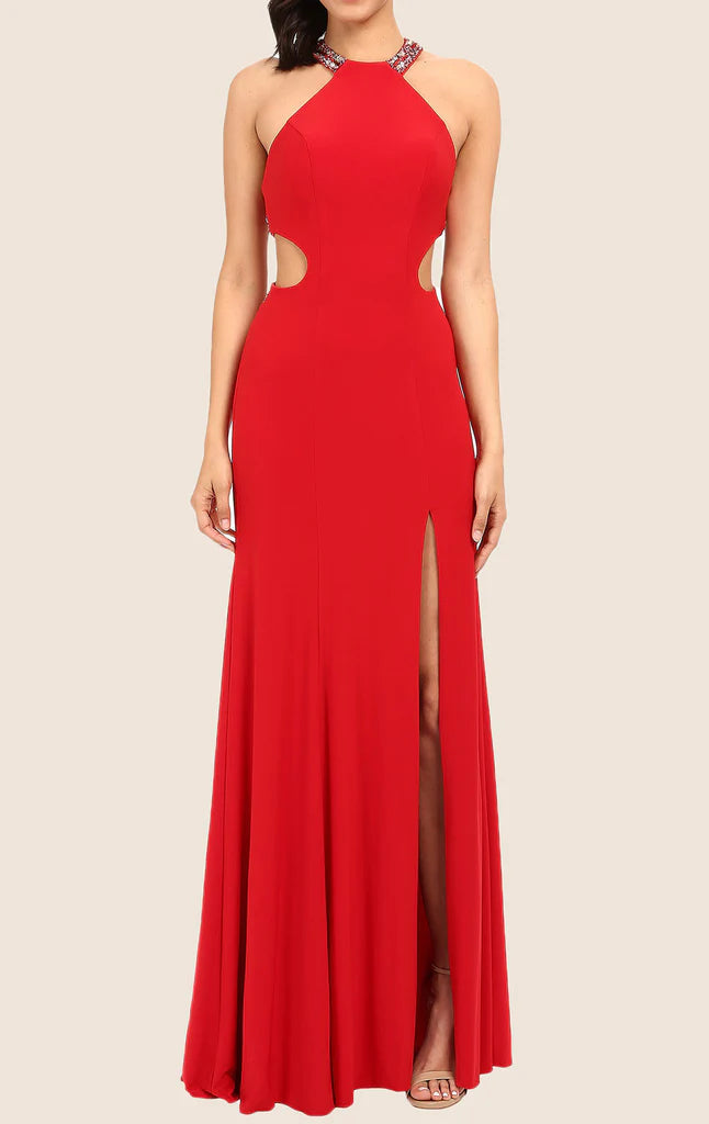 Elegant woman in a halter sheath maxi formal gown with a high slit.