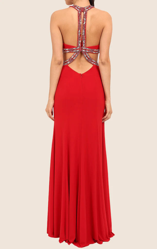 Back view of a woman wearing a sleek halter sheath formal dress.