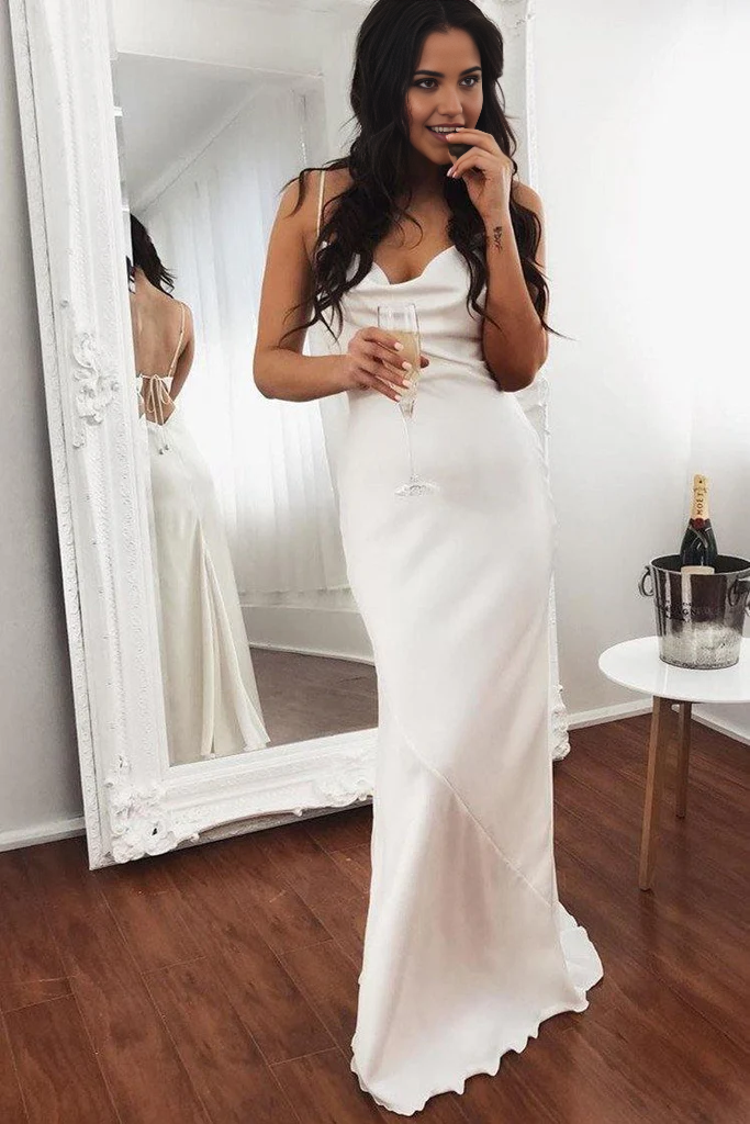 Full view of the long pink mermaid dress with a flowing silhouette.