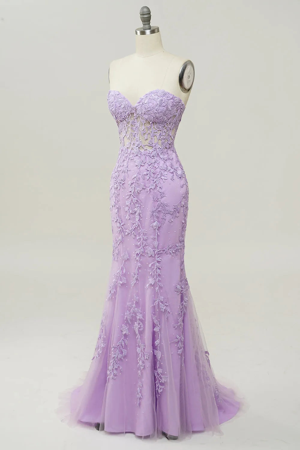 Stunning mermaid silhouette dress with elegant appliques for evening wear.