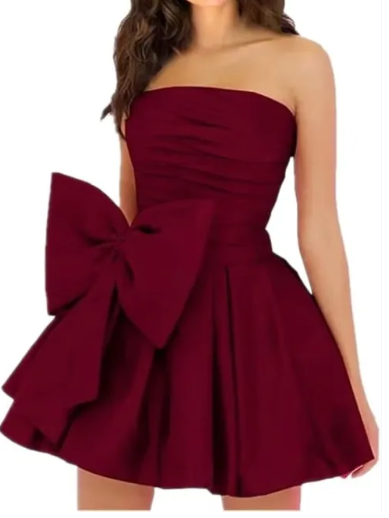 Side view of the short A-line strapless dress, highlighting the ruffle accents.