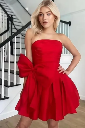 Detail of the fabric and ruching on the strapless A-line homecoming dress.