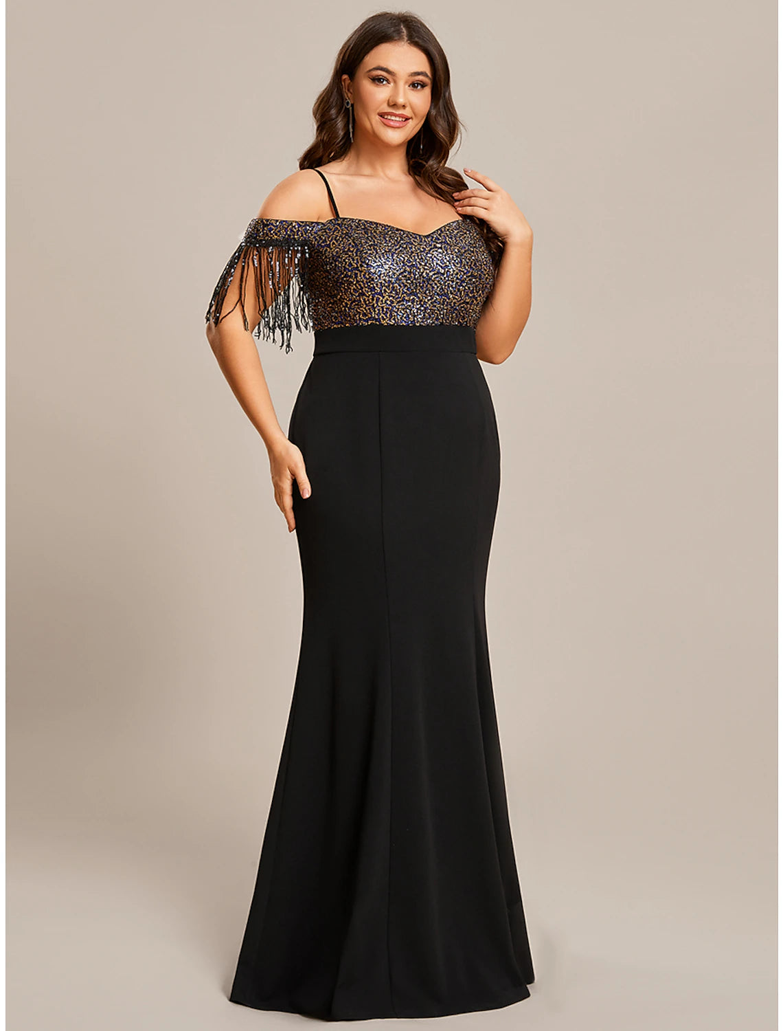 Back view of a formal off-shoulder trumpet gown.