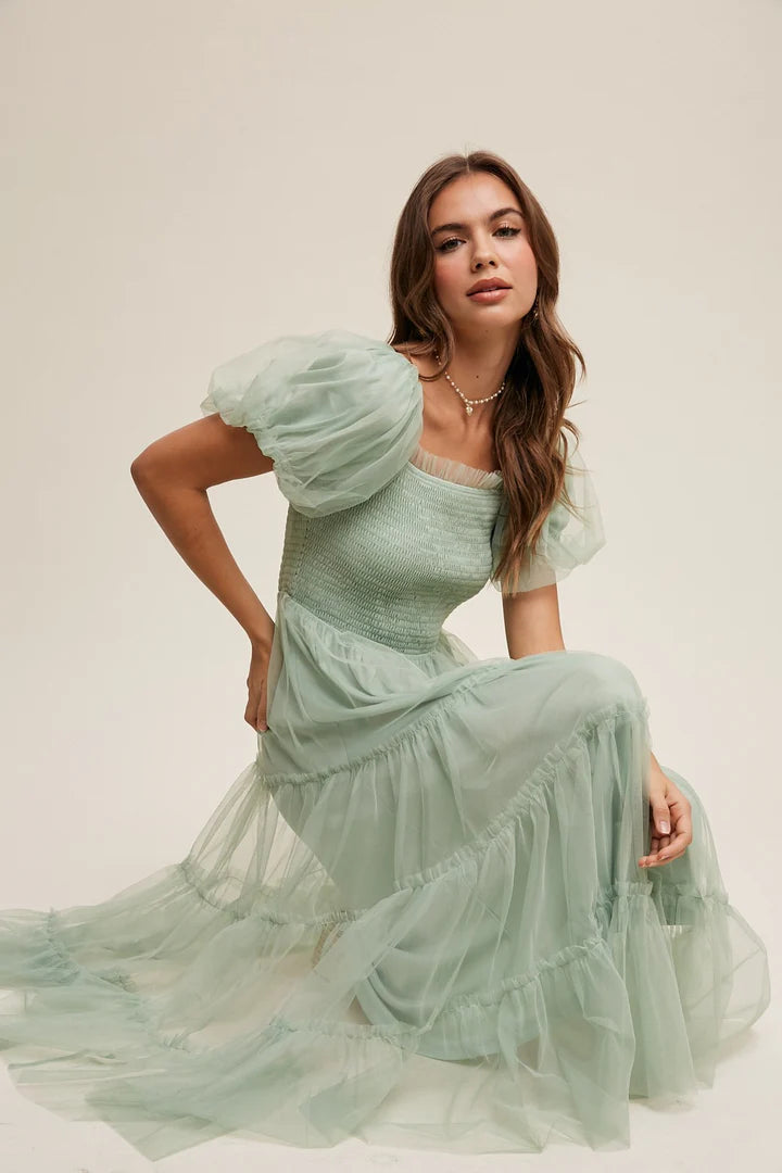 Chic modest V-neck short sleeve A-line midi prom dress on a model.