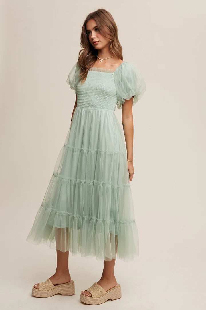 Back view of the modest V-neck short sleeve A-line midi prom dress.