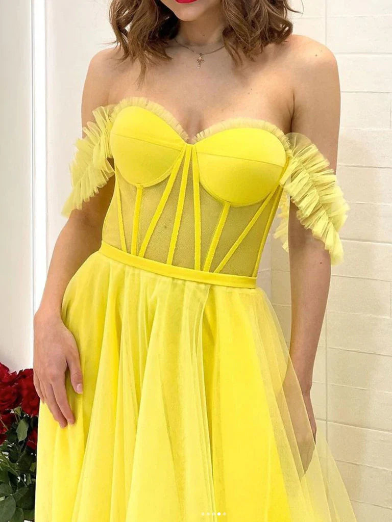 Back view of the flowing A-line skirt and off-shoulder design of the tulle prom dress.