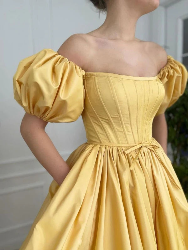 Back view of the sophisticated off-shoulder satin long formal dress.