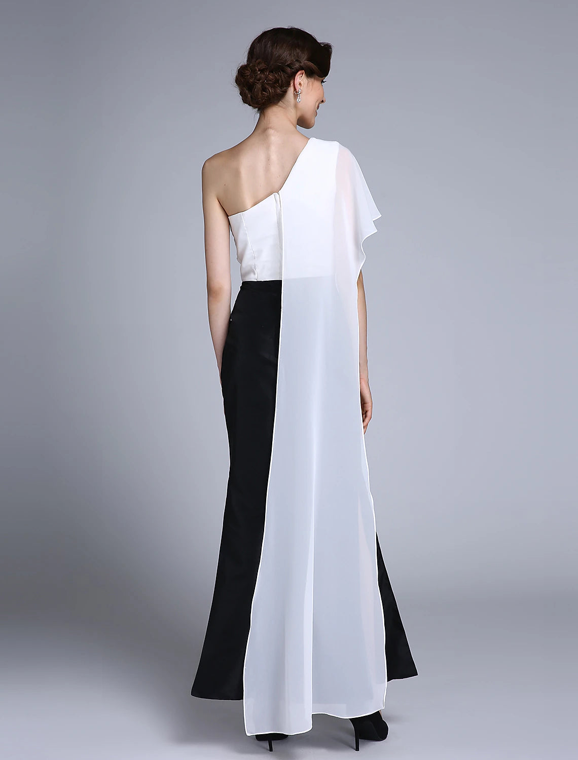 Side view of the color block one-shoulder mermaid trumpet dress, highlighting the silhouette.