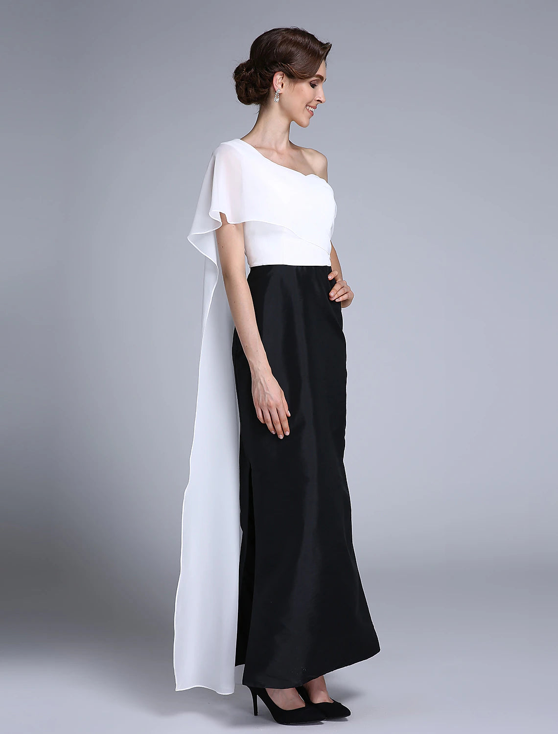 Back view of the elegant one-shoulder chiffon dress, showing the flowing fabric.