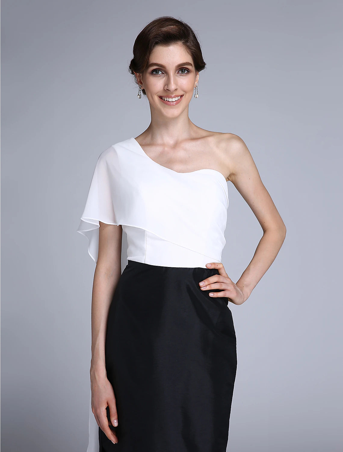 Close-up of the one-shoulder neckline and color block detail on the formal dress.