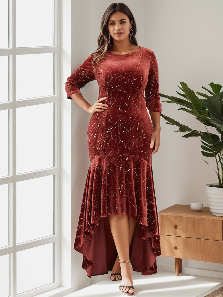 Plus size model wearing a brick red velvet bodycon high-low formal dress.