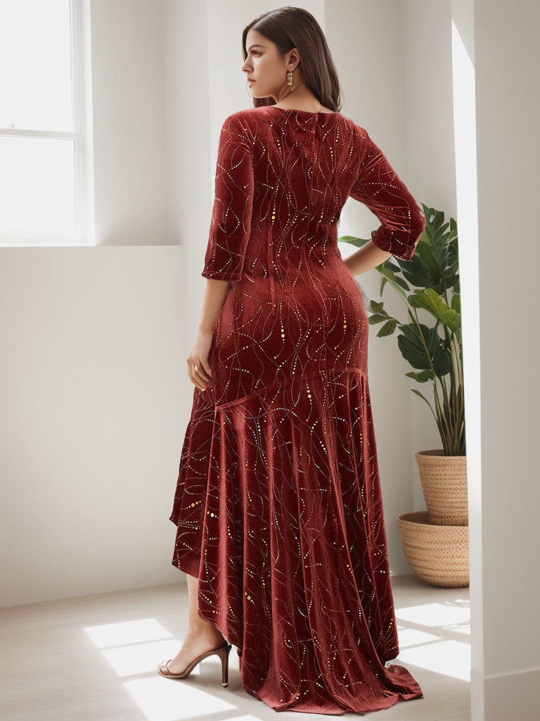 Back view of a plus size model in a brick red velvet bodycon high-low dress.