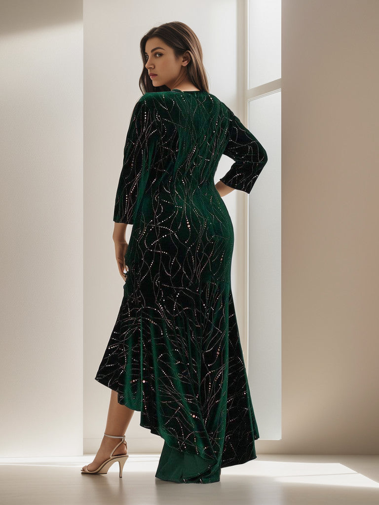 Back view of a plus size model in a dark green velvet bodycon high-low dress.