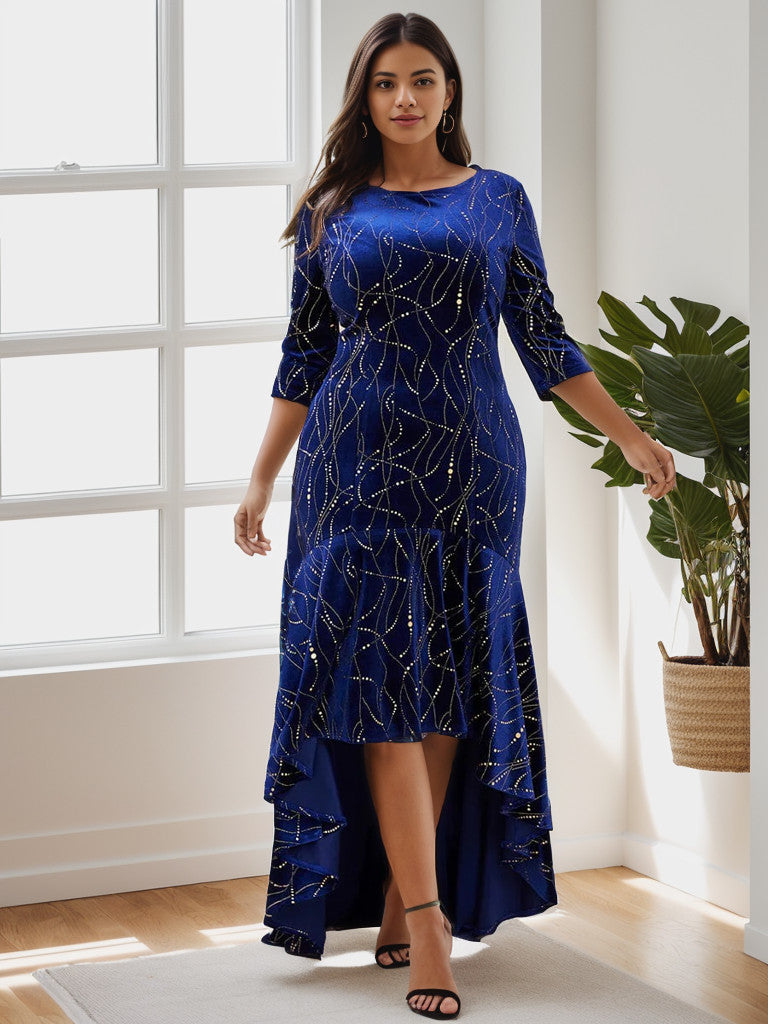Plus size model wearing a royal blue velvet bodycon high-low formal dress.