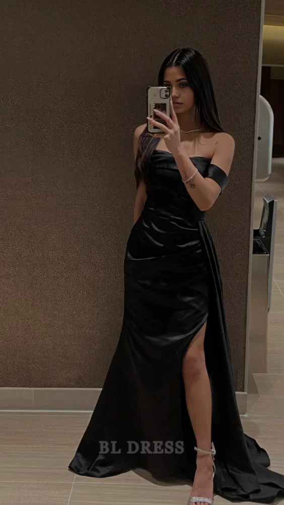 Elegant black satin off-shoulder sheath dress with a thigh-high slit.