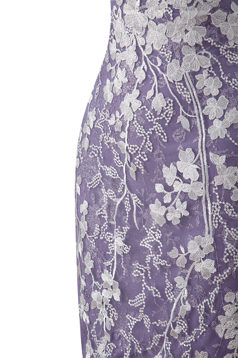 Close-up of the lace fabric and spaghetti straps on the homecoming dress.