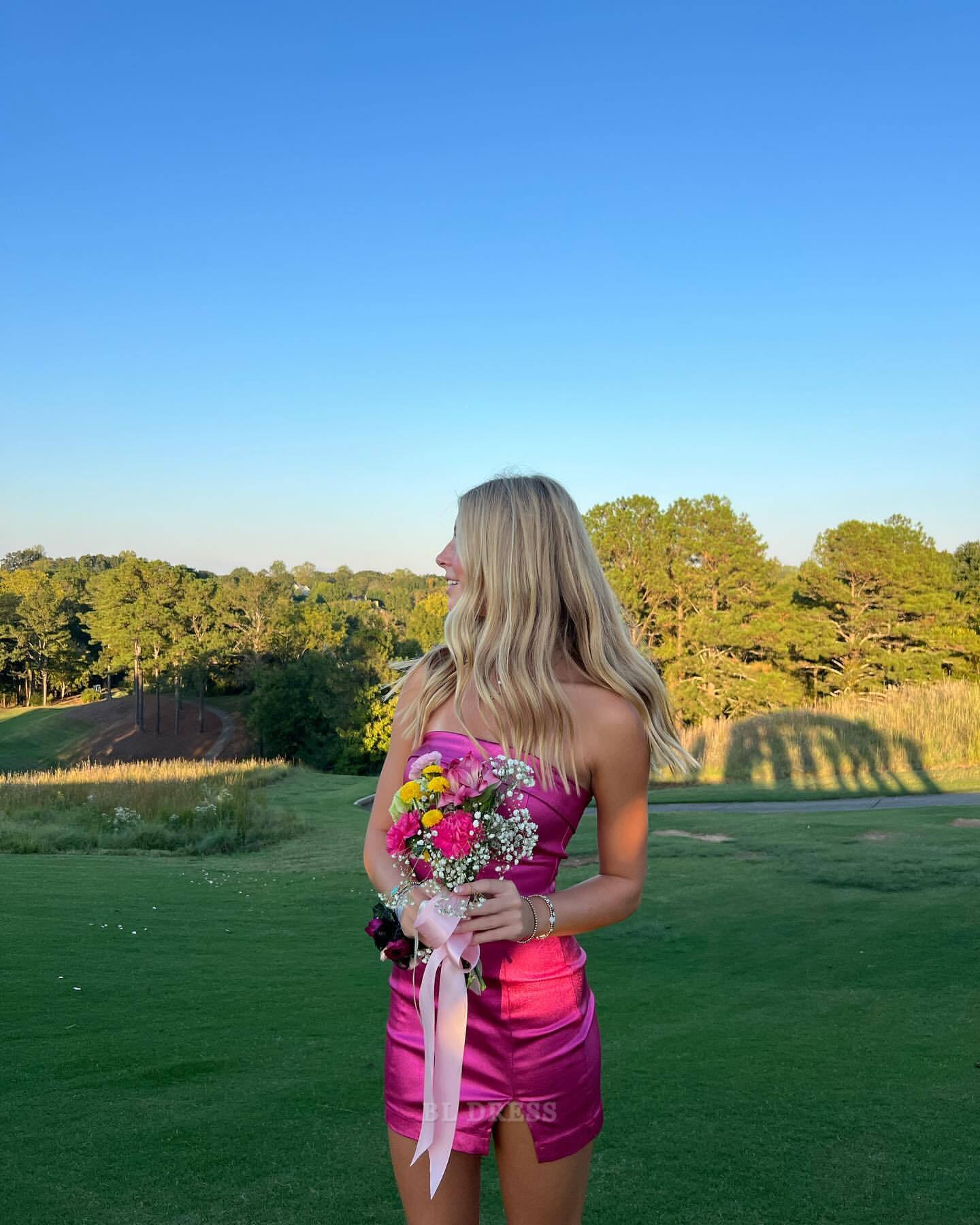 Elegant strapless short pink satin sheath dress for formal events.