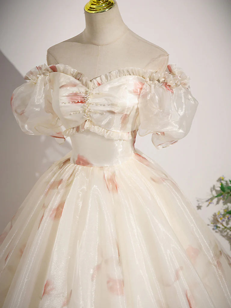 Close-up of the sweetheart neckline and delicate tulle fabric on a prom dress.
